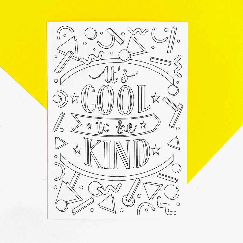 May include: Black and white printable colouring page with the text "It's cool to be kind" surrounded by geometric shapes.