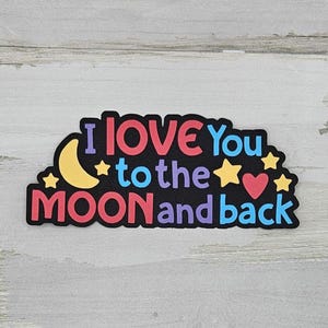 I love you to the moon and back paper pieced die cut title for scrapbooking, card making, and keepsake items