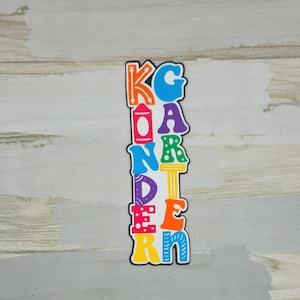 Kindergarten paper pieced die cut title for scrapbooking and keepsake items