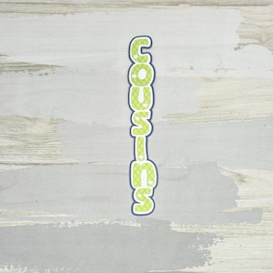 Cousins paper pieced die cut title for scrapbooking, card making, and keepsake items