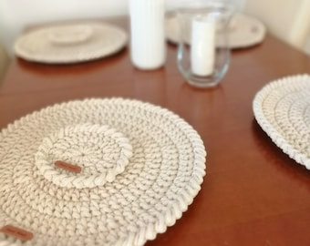 Round table mat with decorative finish.