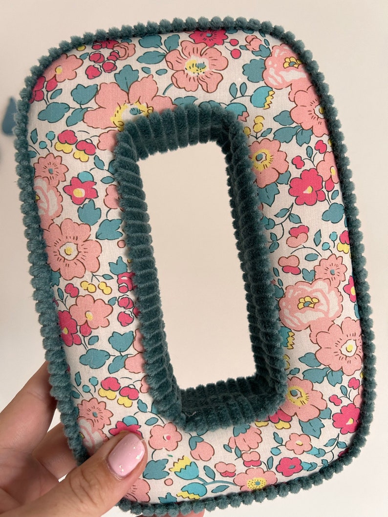 letter O in betsy rhubarb liberty London fabric with teal corduroy trim