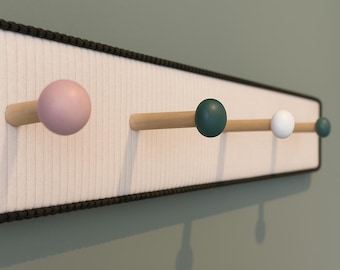 Colourful peg rail.