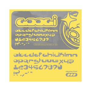 May include: A yellow and gray font design with the word "GOOGI" in a bold, rounded font. The font includes uppercase letters, numbers, and punctuation marks. The text "Googi display typeface by Cody Vondell © 2022" is also included.