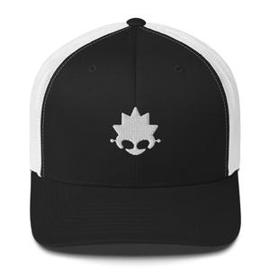 May include: Black and white trucker cap with a white embroidered logo. The cap has a black front panel and peak, with a white mesh back. The logo is a white, stylised design.