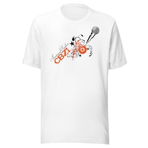 May include: White t-shirt with a black and orange graphic design. The design features a microphone, a musical note, and the text "Irrational Fashion CBZ1".