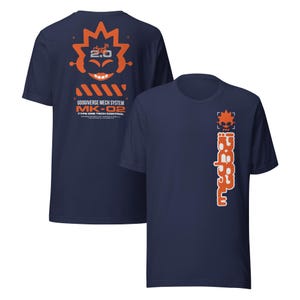 May include: A navy blue t-shirt with an orange graphic on the back and front. The back graphic features a cartoon face with the text "Googiverse Mech System MK-02 Type One Tech Control". The front graphic features a vertical orange design with the text "Googiverse".