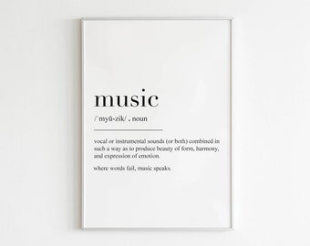 Op de afbeelding: Zwart-witte printbare wandkunst met de definitie van het woord "muziek". De definitie luidt: "Vocale of instrumentale geluiden (of beide) gecombineerd op een manier die schoonheid van vorm, harmonie en expressie van emotie creëert. Waar woorden falen, spreekt muziek."