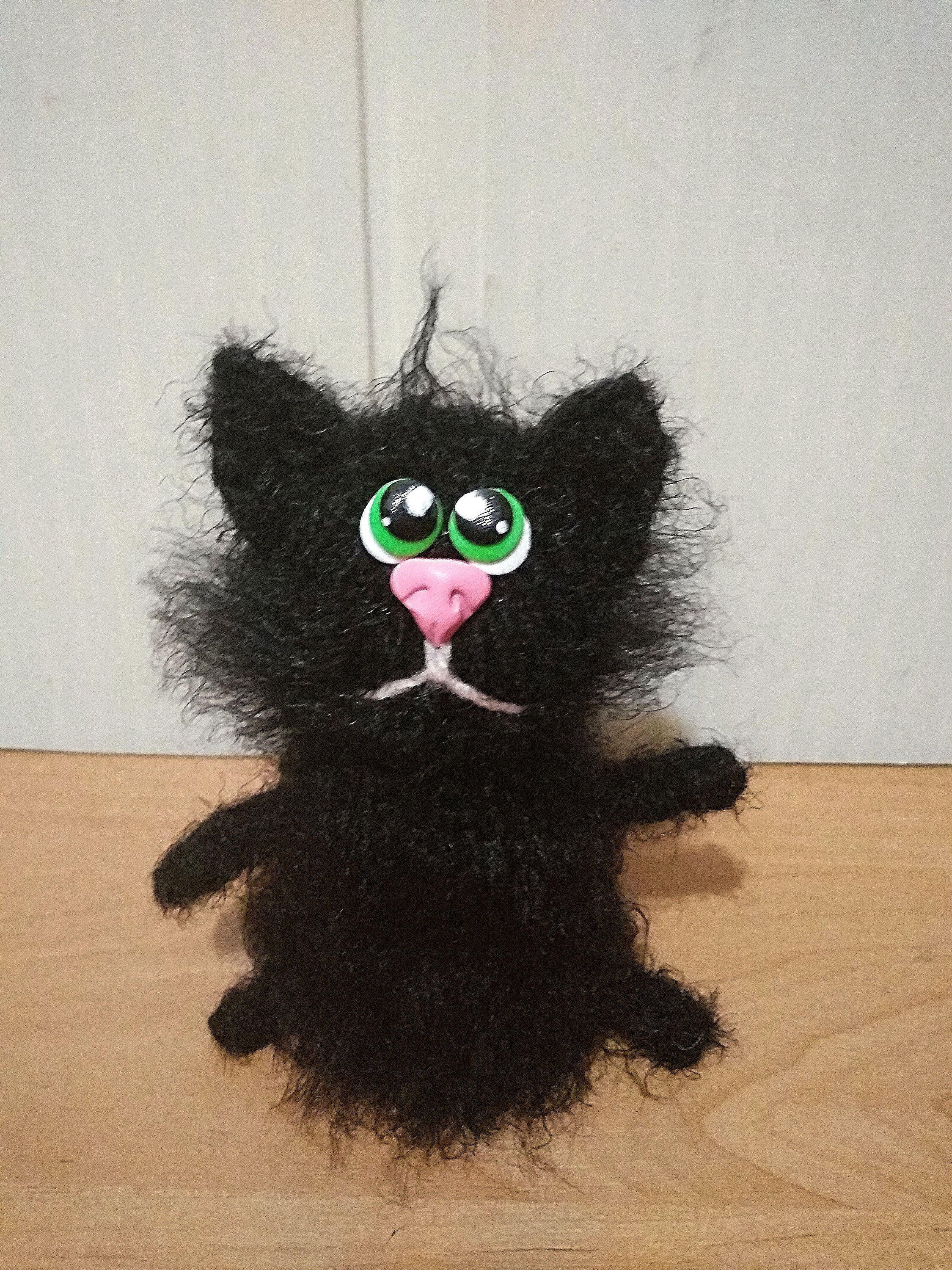black kitty stuffed animal