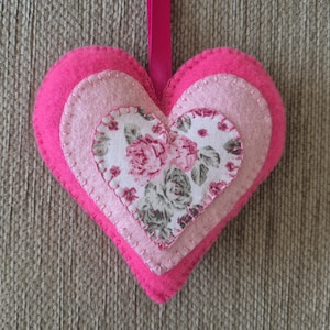 A handmade bright pink felt heart door hanging decoration gift for her/mothers day gift
