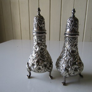 Kirk Repousse Salt and Pepper Casters