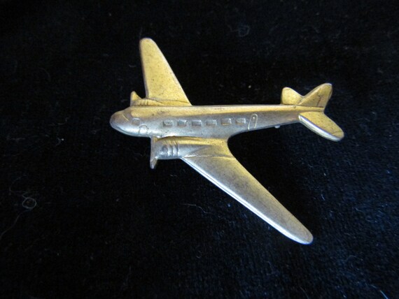 Chanel airplane brooch outlet
