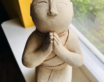 Vandanam Praying Statue