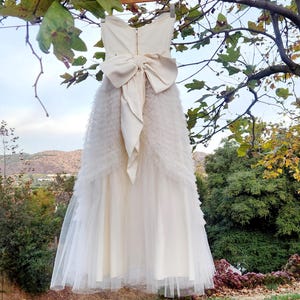 Vintage Cupcake Dress With Sweetheart Neckline Bodice, Multi-Tiered Layers of Tulle And Large Satin Bow Sash