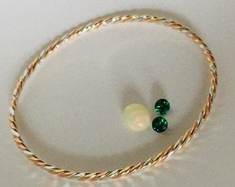 18K Gold, Pure Silver (99.9) and Pure Copper (99.9) Braided Bangle. Harmonizing and balanced. Goldsmith handcrafted. Free Shipping