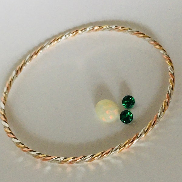 18K Gold, Pure Silver (99.9) and Pure Copper (99.9) Braided Bangle. Harmonizing and balanced. Goldsmith handcrafted. Free Shipping
