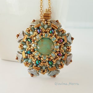 May include: A gold chain necklace with a large, round pendant. The pendant is made of beads in shades of blue, green, gold, and brown. The center of the pendant features a light blue, round stone.