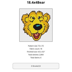 Può includere: Uno schema a punto croce intitolato 18.4x4Bear raffigurante una testa di orso gialla con naso nero, riflesso blu e bocca aperta. I dettagli includono una griglia 72x72, tela 18 count, 10,16 x 10,16 cm, 2.843 punti e 6 matassine.