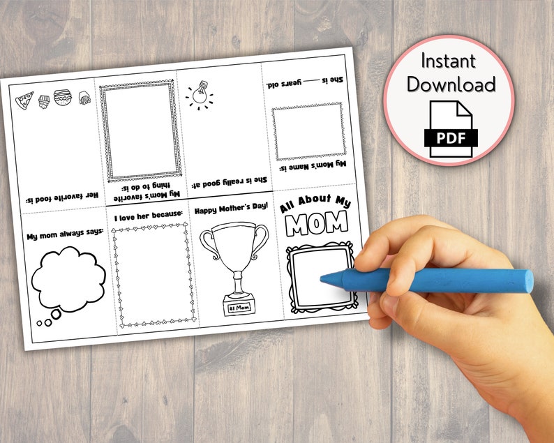 May include: A black and white printable Mother's Day activity sheet with fill-in-the-blank sections. The sheet includes prompts like "My Mom's favorite thing to do is" and "I love her because." A blue crayon is held over the sheet.