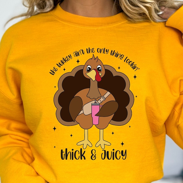 The turkey ain't the only thing looking thick and juicy sweatshirt. Trendy Thanksgiving shirt. Water bottle. Belt bag. Funny turkey shirt