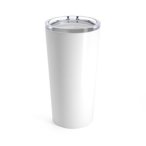 May include: A white tumbler with a clear lid and a silver rim. The tumbler is cylindrical and appears to be made of a glossy material. The design is simple and modern, suitable for various beverages.