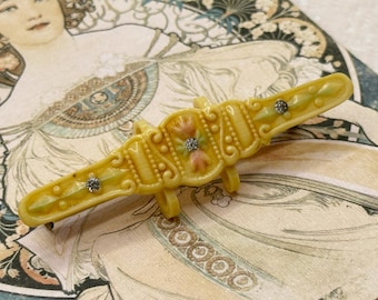 Spilla vintage in celluloide e strass, anni '20/'30, con barra rialzata