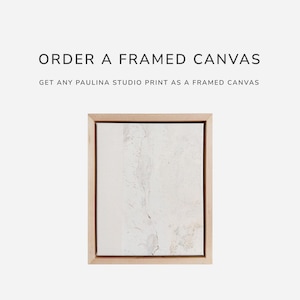 a picture frame with a picture of a white wall