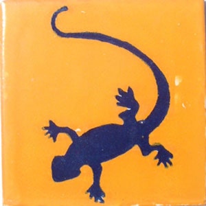 May include: A black silhouette of a lizard on an orange background.