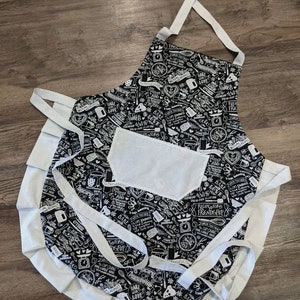 Adult apron. Woman's apron. Baking measurements and saying on black. Mini black and white polka dots on pocket, ties and frills. image 2