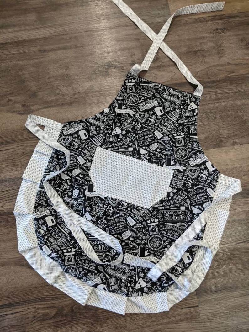 Adult apron. Woman's apron. Baking measurements and saying on black. Mini black and white polka dots on pocket, ties and frills. image 2