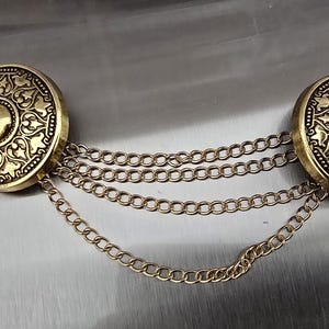 New! Celtic cloak clasp, Gold coloured, 27mm metal shank, Button and 90mm double looped chain. Please read description for instructions.
