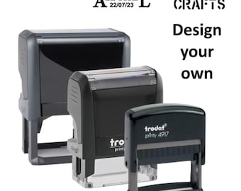 May include: Three black self-inking stamps with clear plastic tops. The stamps are labeled "trodat printy 4917", "trodat printy", and "A LE TRAIL 22/07/23". The text "ARTS & CRAFTS Design your own" is in the upper right corner of the image.