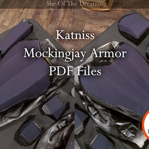 May include: A set of dark blue fabric pieces for crafting a Mockingjay armor costume. The pieces are laid out on a black surface. The text "Katniss Mockingjay Armor PDF Files" is visible in the image. The text "PDF Digital Download" is also visible in the image.