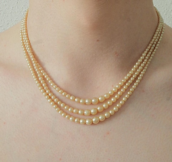 Antique triple-strand "essence d'orient" pearl necklace. German sterling silver Art Deco clasp. Bridal pearls, circa 1930-1950.