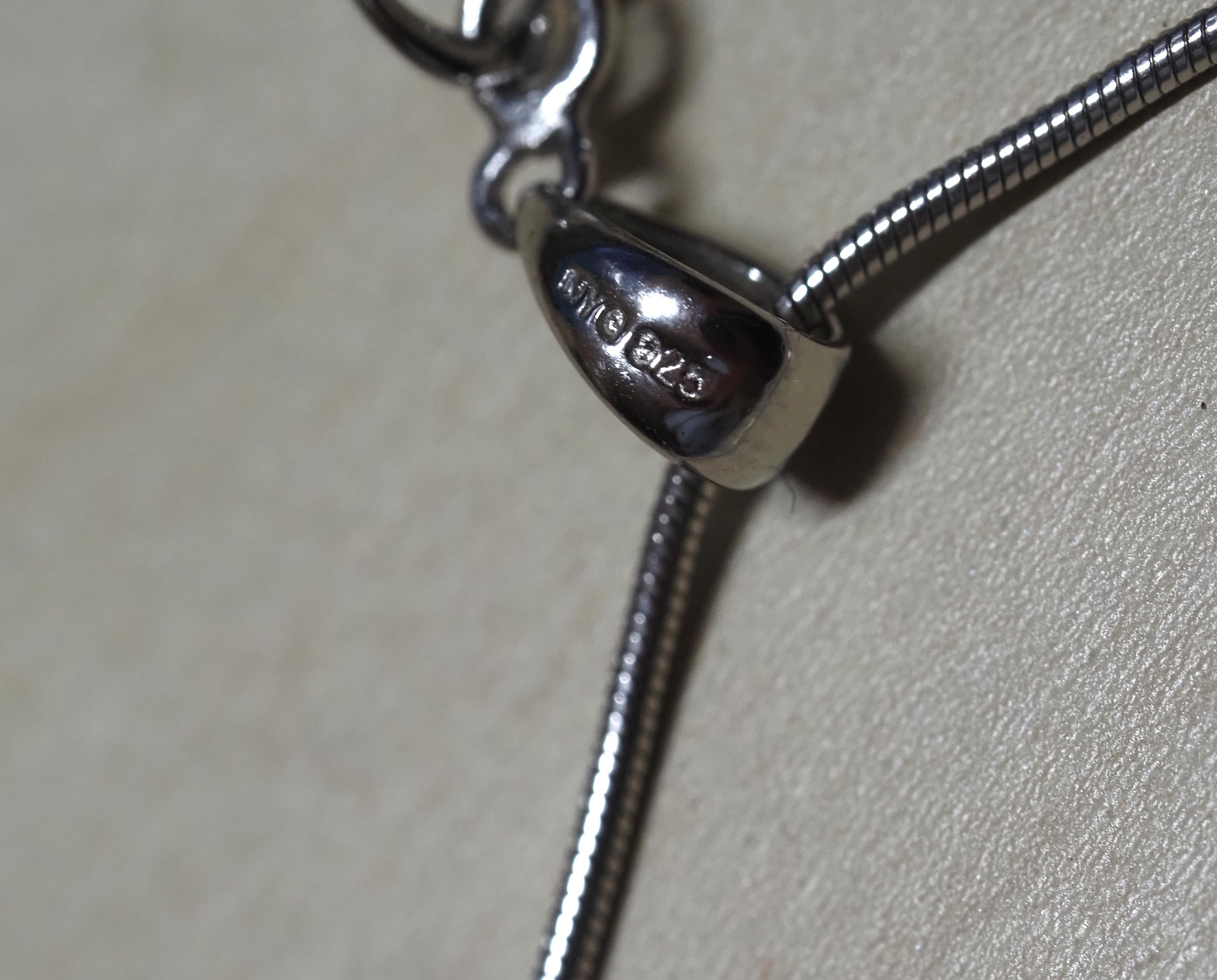 An Elegant 925 Sterling Silver Necklace With Cubic Zirconia