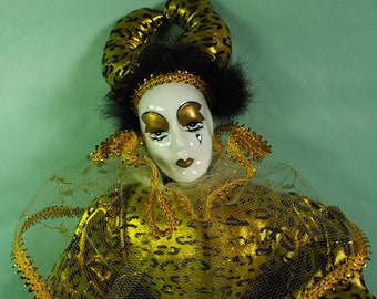 Vintage porcelain Harlequin doll.