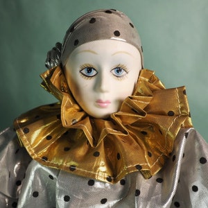 Vintage porcelain Harlequin doll.