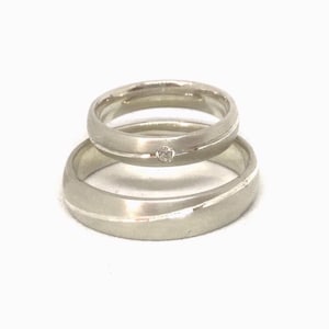Half round Wedding ring with line engravement for him and her in gold or silver with a diamond or zirconia