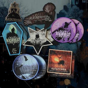 May include: A collection of Katatonia embroidered patches in various shapes including a coffin, star, circles, and squares. The patches feature band logos, album titles like The Fall of Hearts, Viva Emptiness, Brave Murder Day, and Tonight's Decision, and dark, atmospheric graphic illustrations in black, purple, blue, and orange tones.