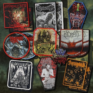 May include: A collection of rectangular, circular, and coffin-shaped embroidered fabric patches featuring various death metal band logos and graphic illustrations in black, white, red, and orange, including Cannibal Corpse, Edge of Sanity, and Autopsy.
