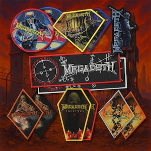 May include: A collection of embroidered Megadeth patches featuring various album artwork and logos. The set includes circular, diamond, coffin, and rectangular shapes with vibrant graphics, including skeletons, skulls, and the band name in stylised lettering.