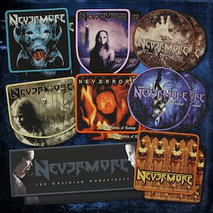 May include: A collection of rectangular, circular, and shield-shaped fabric patches featuring the band name Nevermore and various album artwork. The patches display graphic illustrations, including figures, skulls, and flames, with embroidered borders.