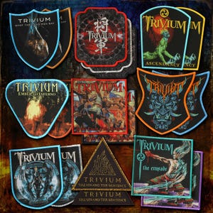 May include: A selection of Trivium band patches, showcasing album artwork and logos. The patches include text like "What the Dead Men Say," "Ascendancy," and "The Sin and the Sentence." The patches are in various shapes and colours, with embroidered details.