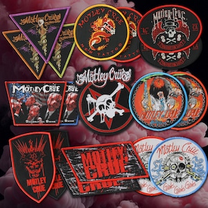 May include: A collection of embroidered patches featuring the band Mötley Crüe. Designs include the band's logo, skulls, dragons, and other graphics in various shapes and sizes. Colors include black, red, white, and purple.