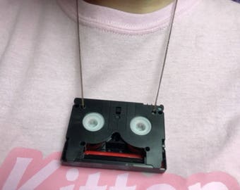 Upcycled DV casette necklaces