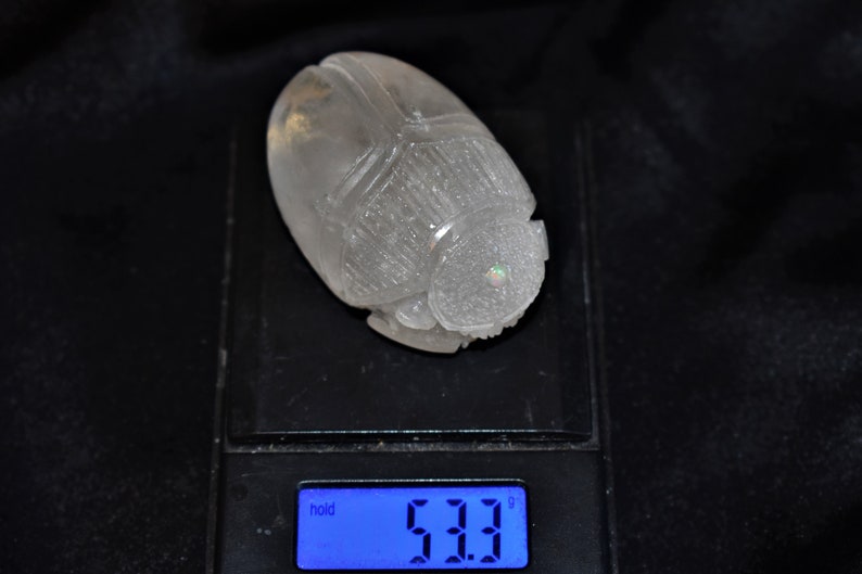 266ct Quartz Crystal Scarab with gold hieroglyphics and a 3mm Ethiopian opa