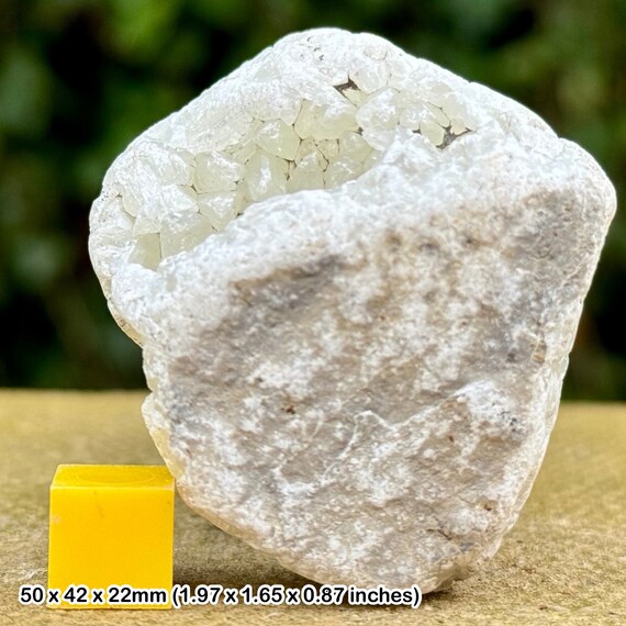 Genuine jurassic dogtooth calcite crystals - ston… - image 1