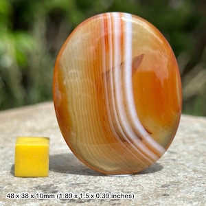 Banded carnelian palm stone worry stone crystal healing - genuine specimen with certificate
