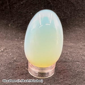 Adorno de cristal de opalita pulido con forma de huevo, ejemplar decorativo de Madagascar con certificado de autenticidad.