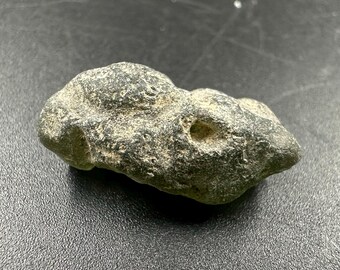 Moldavite translucent green tektite – genuine impact glass from czech republic